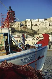 Cyclades Gallery: Boat and village, Naxos, Cyclades, Greek Islands, Greece, Europe