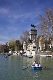 Rowing Prints: Boating on boating lake of El Estanque in spring sunshine, Parque del Retiro