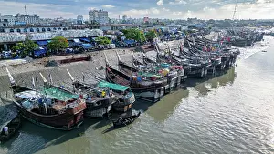 Small Prints: Boats anchor at fish market on Karnaphuli River in Chittagong