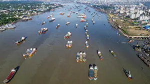 Docked Prints: Boats anchor on Karnaphuli River near fish market in Chittagong region of Bangladesh
