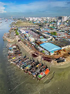 Fishermen Prints: Boats anchored along the Karnaphuli River near a busy fish market in Bangladesh