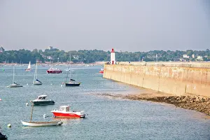 Recreational Prints: Boats are anchored near the lighthouse at Saint-Malo harbor in Brittany