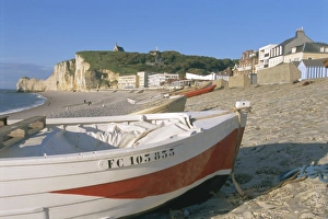 Etretat Prints: Boats on beach and Falaise d Amont, Etretat, Cote d Albatre (Alabaster Coast)