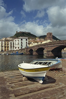 Bosa Prints: Boats beside a bridge over the Temo River at Bosa on