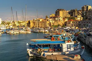 Vessel Prints: Boats docked at Heraklion Venetian Port during sunset in Crete