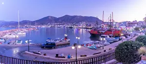 Sailboats Prints: Boats docked at Port of Limenas Chersonisou during dusk in Crete, Greek Islands, Greece
