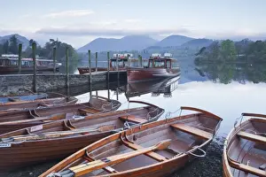 Rowboats Prints: Boats at the edge of Derwent Water in the Lake District National Park