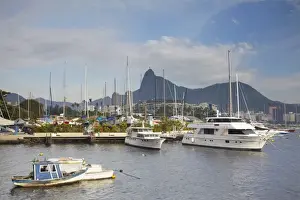 Guanabara Bay Prints: Boats in Guanabara Bay with Christ the Redeemer statue (Cristo Redentor) in the background