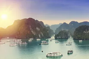 Mist Collection: Boats on Halong Bay at sunset, UNESCO World Heritage Site, Vietnam, Indochina, Southeast Asia