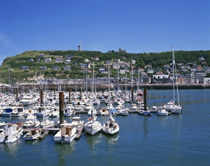 Fecamp Prints: Boats in the harbour with the town in the background, at Fecamp, Haute Normandie