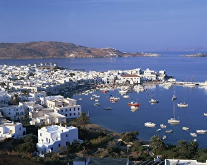Mikonos Prints: Boats in the harbour and windmills on the coast