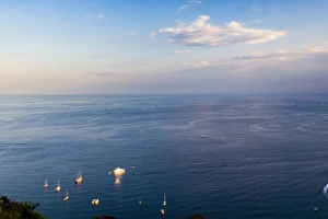 Taormina Prints: Boats on the Ionian Sea, part of the Mediterranean Sea at sunset