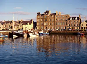 Boats in Kirkwall harbour at dusk
