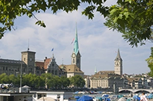 Boats on the Limmat River with St