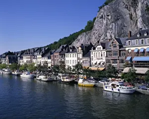 Ardennes Prints: Boats line the waterfront on the River Meuse in the old town of Dinant in the Ardennes