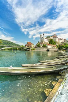 Boats moored in Aare River with Aarburg Castle in background, Aarburg, Canton of Aargau