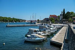 Docked Prints: Boats moored at the harbor of the old city in Stari Grad