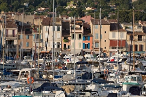 Crowded Prints: Boats moored in the harbour of the historic town of Cassis, Cote d Azur, Provence