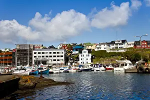 Tinganes Prints: Boats moored in the harbour which is located next to the historical area known as Tinganes