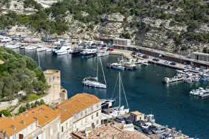 Corsica Prints: Boats moored in the marina in the southern Corsica town of Bonifacio, Corsica, France
