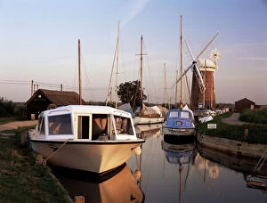Mill Collection: Boats moored near Horsey windmill, Norfolk Broads, Norfolk, England, United Kingdom