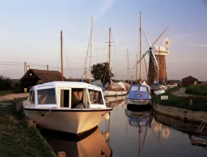 Norfolk Prints: Boats moored near Horsey windmill, Norfolk Broads, Norfolk, England, United Kingdom