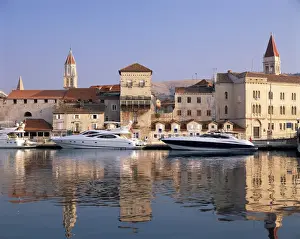 Boats moored in front of the Old Town, Trogir, UNESCO World Heritage Site