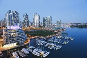 Boats moored on the waterfront in Fals e Creek Harbour, Vancouver, Britis h Columbia