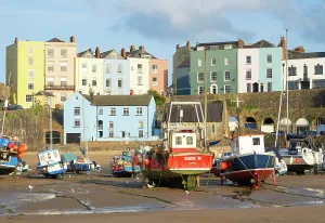 Pembrokeshire Prints: Boats and pastel buildings at Harbour Beach in Tenby