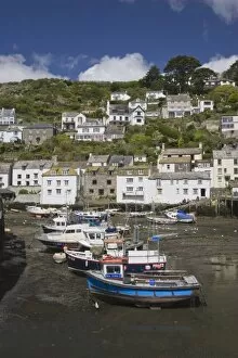 Boats in Polperro harbour at low tide, Cornwall, England, United Kingdom, Europe