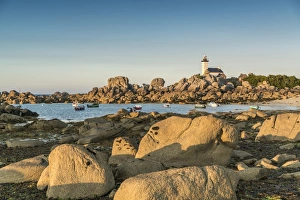 Boats and Pontusval lighthouse, Brignogan Plage, Finistere, Brittany, France, Europe