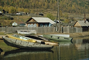 Siberia Prints: Boats pulled out of water and wooden houses