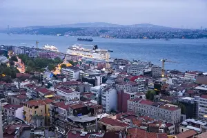 Bosphorus Strait and cruise ship at night seen from Galata Tower, Istanbul, Turkey