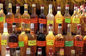 Eating And Drinking Prints: Bottles of local rum drinks at Le Diamant village