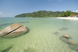 Boulders and visitors at Coral Bay beach