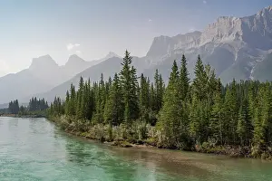 Haze Prints: Bow River and Mount Lawrence Grassi on a hazy summer evening caused by wildlife smoke