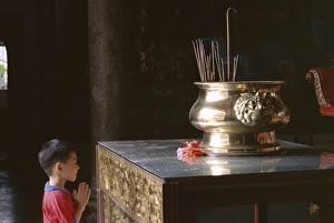 Meditating Prints: Boy praying at Kek Lok Si Temple
