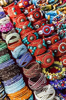 Bright Color Prints: Detail of bracelets and rings at the Tibetan Market in Wednesday Flea Market in Anjuna
