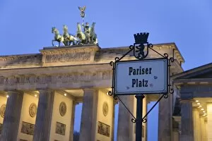 Images Dated 24th February 2009: Brandenburg Gate (Brandenburger Tor) and Quadriga winged victory and road sign Pariser Platz