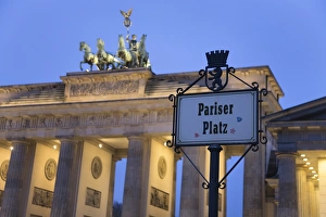 Images Dated 24th February 2009: Brandenburg Gate (Brandenburger Tor) and Quadriga winged victory and road sign Pariser Platz