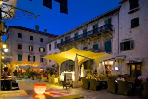 Pavement Cafes Prints: Brasna Square at dusk, Old Town, UNESCO World Heritage Site, Kotor, Montenegro, Europe
