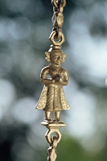 Brassware Prints: Detail of brass chain from which a swing chair