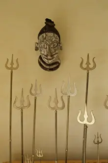 Disguise Prints: Brass reproductions of Lord Shivas trident as a decorative feature