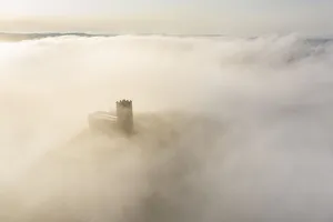 Dartmoor Prints: Brentor Church surrounded by morning mist in autumn, Dartmoor, Devon, England