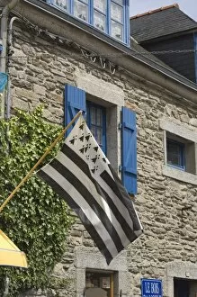 Breton flag in the old walled town of Concarneau, Southern Finistere, Brittany