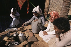 Egyptian Prints: Brewing coffee outside a Bedouin tent, Sinai, Egypt, North Africa, Africa