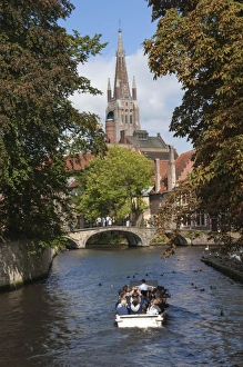 Bruges Prints: Bridge to Begijnhof, and spire of Church of Our Lady, tourist launch, Bruges, UNESCO