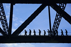 Scaling Prints: Bridge climb participants in silhouette, Sydney Harbour Bridge, Sydney