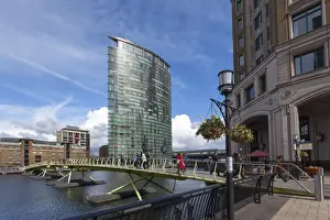 Docklands Prints: A bridge crossing the North Quay with the London Marriott Hotel behind