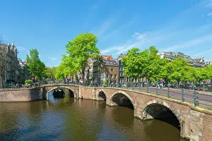 Pedestrians Prints: Bridges at intersection of Keizersgracht and Reguliersgracht canals